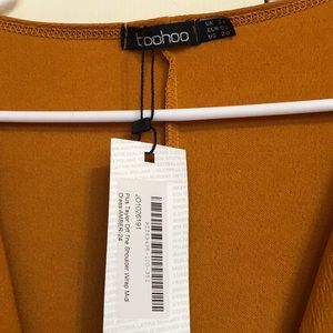 Boohoo plus mustard color dress  US20